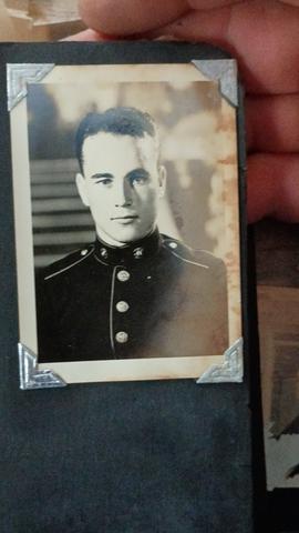 WWII-era US Marine Corps portrait photo in black album with metal corners